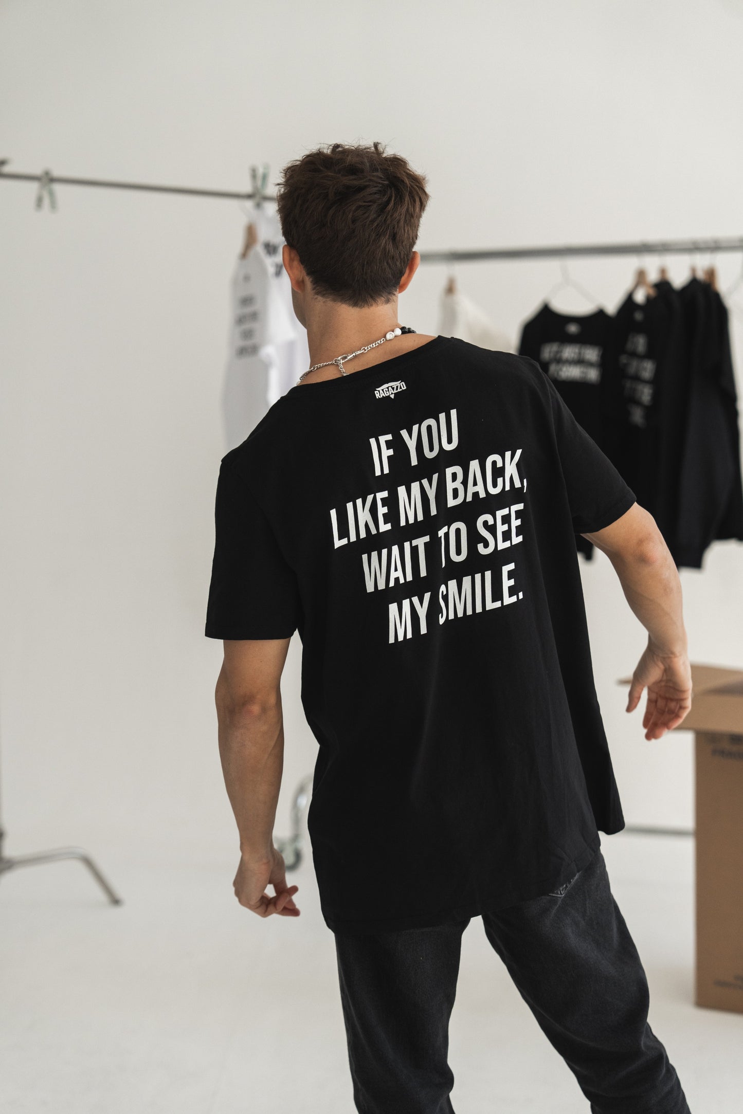 T-Shirt • Black • "If You Like My Back, Wait to See My Smile"