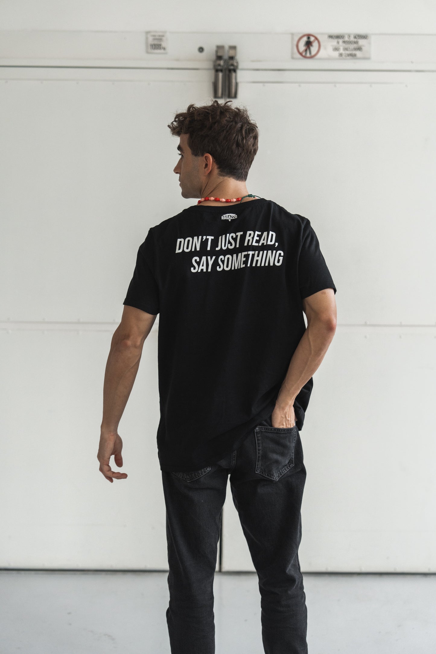 T-Shirt • Black • "Don’t Just Read, Say Something"